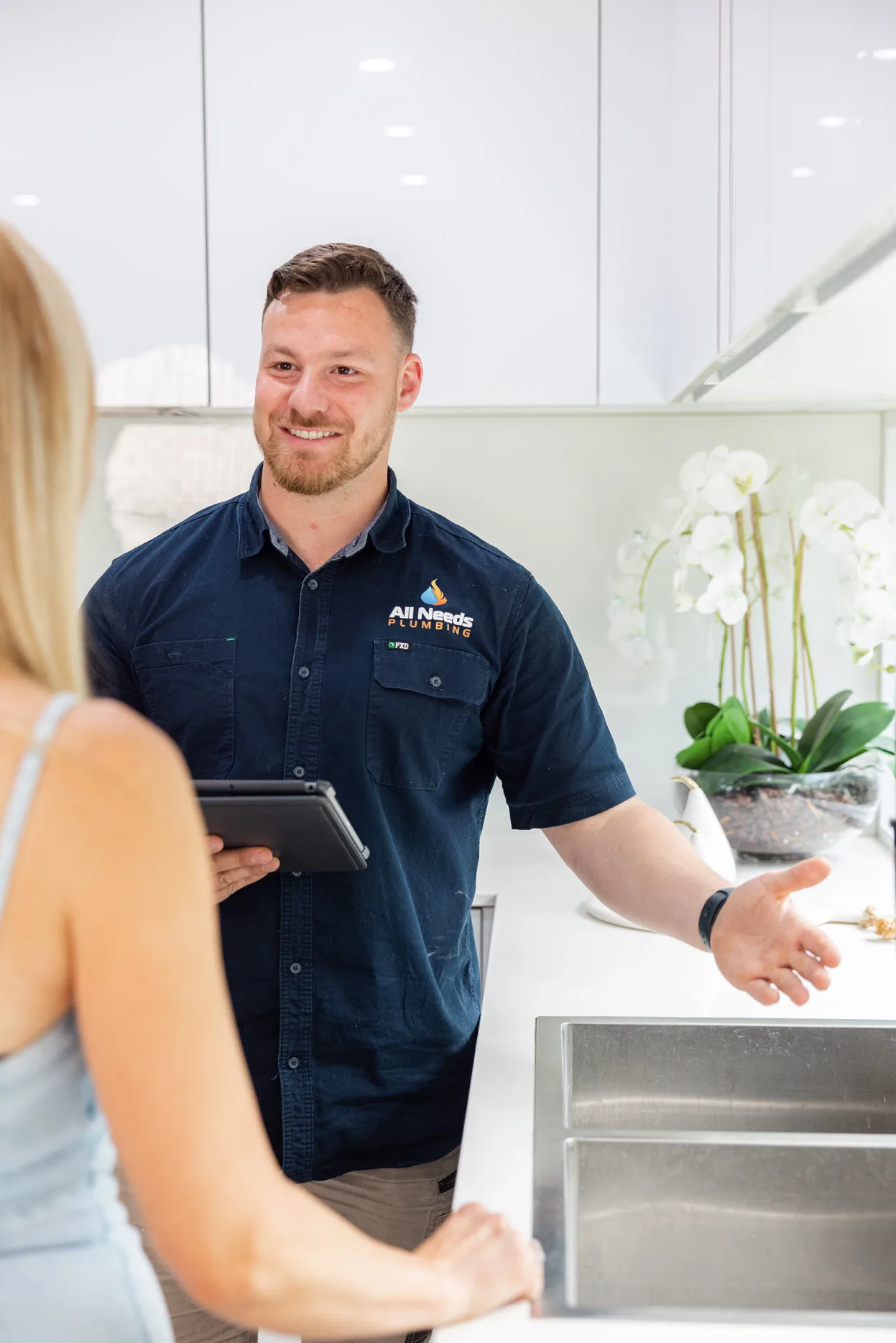 Client meeting for kitchen plumbing