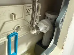 In-wall cistern opened behind the flush plate in Grays Point