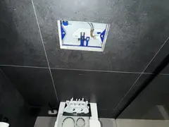 In-wall cistern opened behind the flush plate in a Gymea Bay bathroom