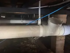 PVC sewer pipe under a Loftus house