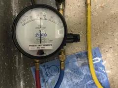 Backflow test gauge connected to a testable device in Menai