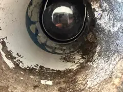 Bathroom floor waste after sand was cleared at a childcare centre in Miranda
