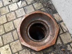 Outdoor drain gully after a grease blockage was cleared in Miranda