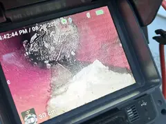 Drain camera screen showing the inside of a sewer line in Oyster Bay