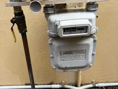 Gas meter with a new regulator and unions fitted at a Sylvania home