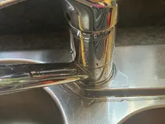 New kitchen mixer tap over a sink in Waterfall
