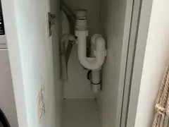 New trap fitted for a washing machine drain in a Woolooware laundry